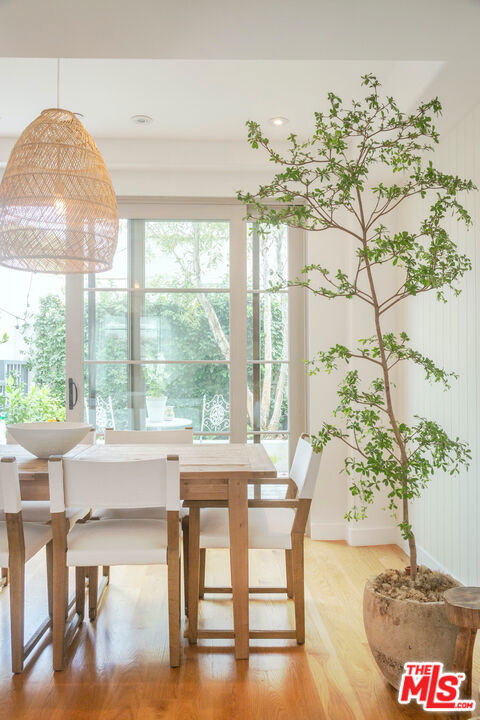 dining area with hardwood / wood-style floors