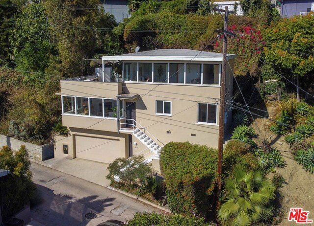 view of front of house with a garage