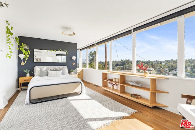 bedroom featuring hardwood / wood-style floors