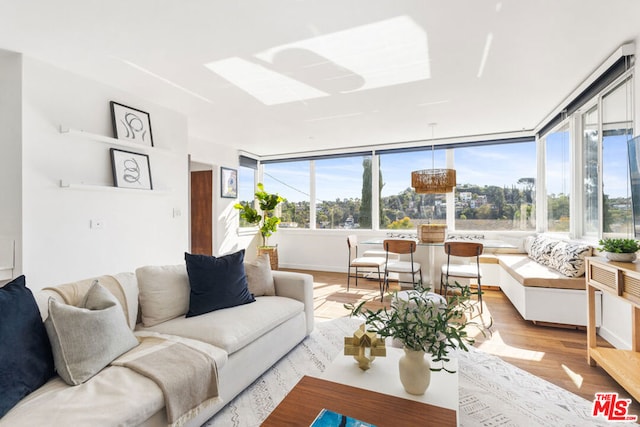 living room with light hardwood / wood-style flooring