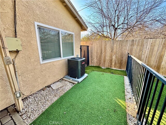 view of yard featuring cooling unit