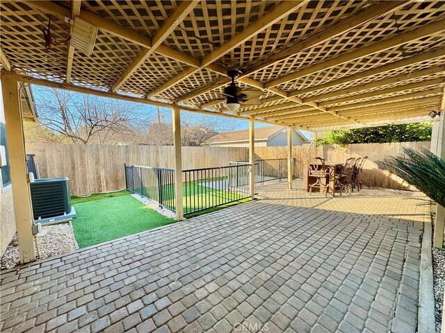 view of patio / terrace featuring ceiling fan and cooling unit