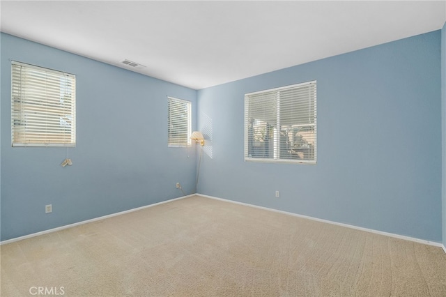 view of carpeted spare room