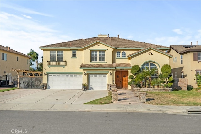 mediterranean / spanish-style house featuring a garage