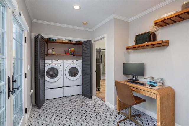 laundry room featuring crown molding, washer and clothes dryer, and french doors