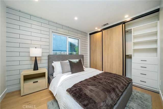 bedroom featuring light wood-type flooring