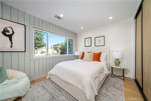 bedroom featuring light wood-type flooring