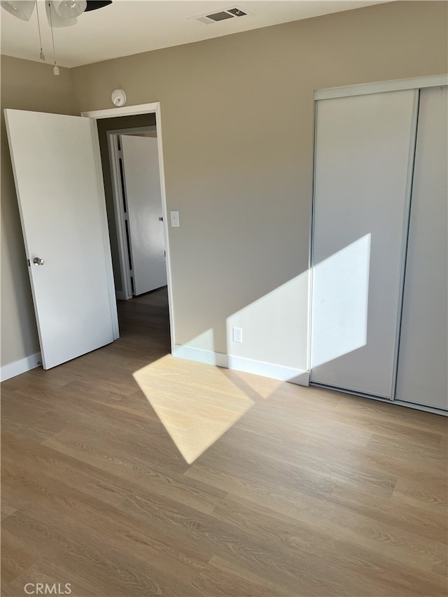 interior space featuring ceiling fan and light hardwood / wood-style flooring