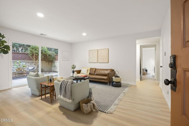 living room featuring light wood-type flooring