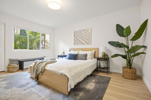 bedroom featuring hardwood / wood-style flooring