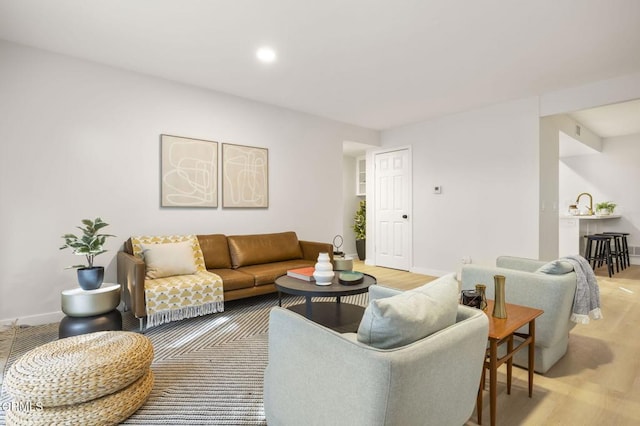 living room featuring sink