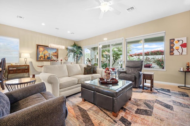 living room with ceiling fan