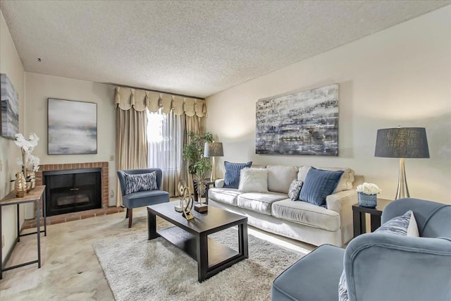 living room with a fireplace and a textured ceiling