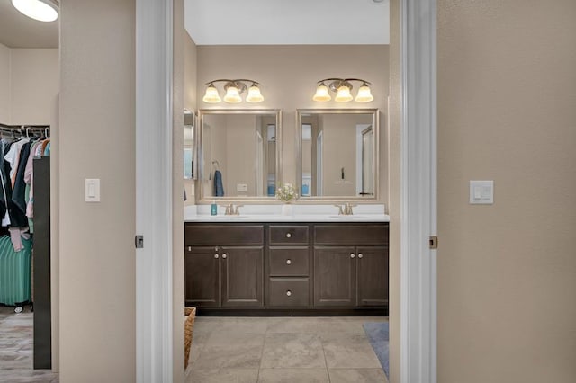 bathroom featuring tile patterned floors and vanity