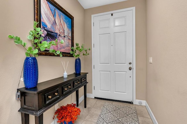 view of tiled foyer