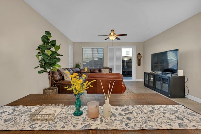 living room with ceiling fan