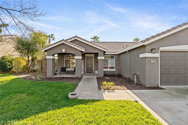 single story home featuring a front yard and a garage