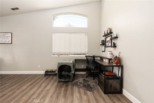 office space featuring hardwood / wood-style floors