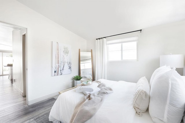 bedroom featuring wood-type flooring