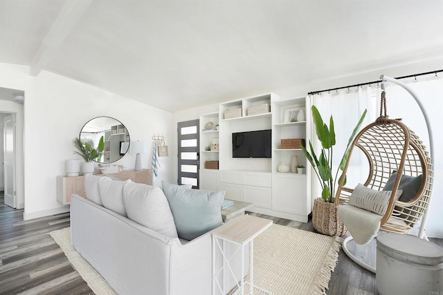 living room with hardwood / wood-style flooring and beamed ceiling