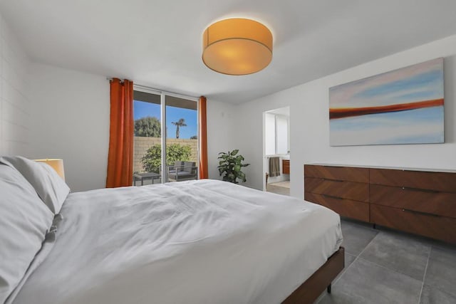 tiled bedroom featuring expansive windows