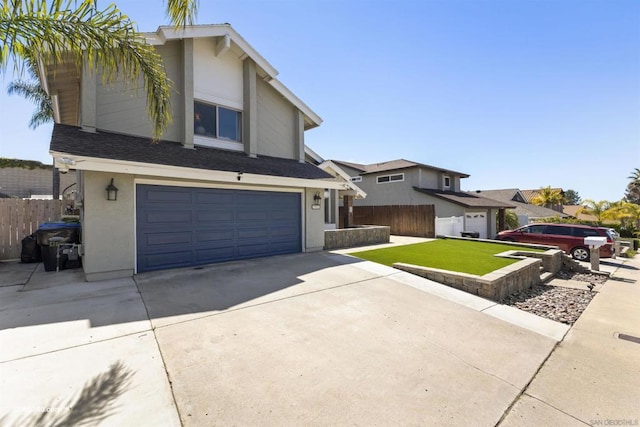 front facade with a front lawn and a garage