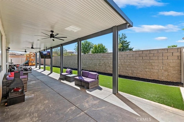 view of patio / terrace featuring a playground, ceiling fan, and an outdoor hangout area