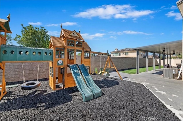 view of jungle gym with a patio area and central AC unit