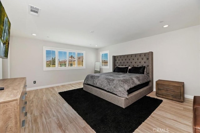 bedroom featuring light hardwood / wood-style floors