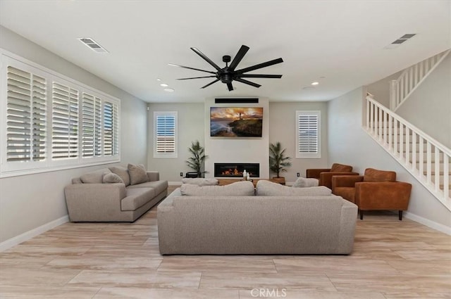 living room with ceiling fan