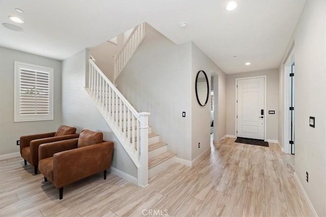 entryway with light hardwood / wood-style flooring