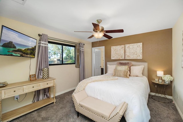 bedroom with ceiling fan and dark colored carpet