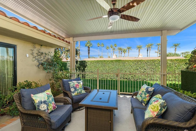 view of patio featuring ceiling fan and an outdoor living space