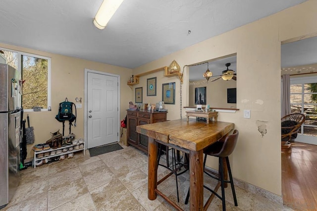 dining area featuring ceiling fan