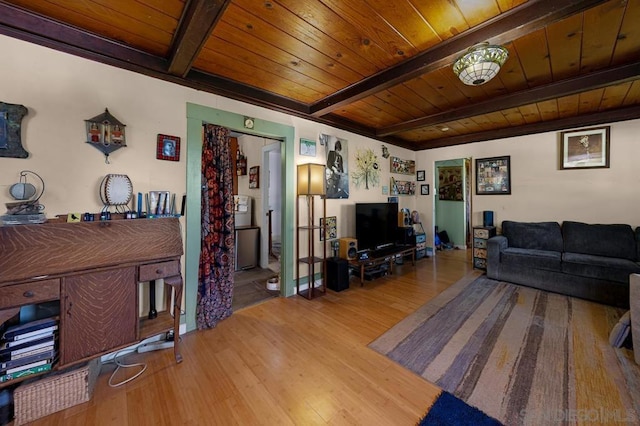 living room with wooden ceiling, hardwood / wood-style floors, and beam ceiling