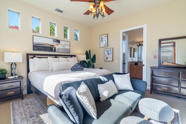 carpeted bedroom featuring ceiling fan and connected bathroom