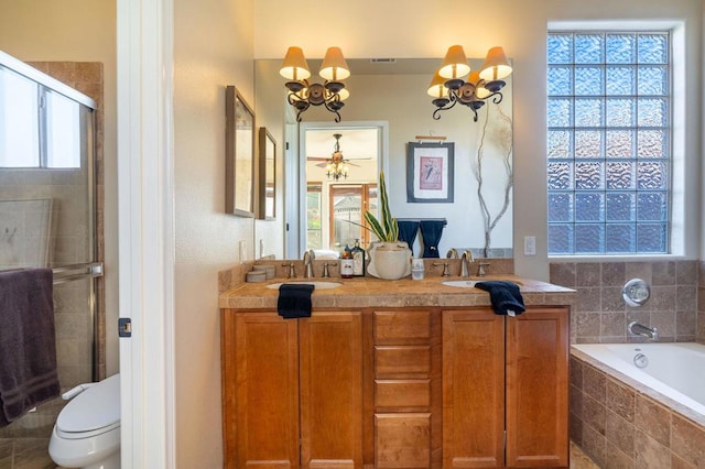 full bathroom featuring a wealth of natural light, toilet, a notable chandelier, and plus walk in shower