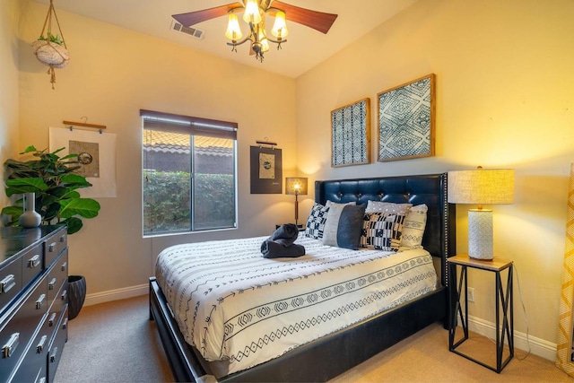 bedroom with light carpet and ceiling fan