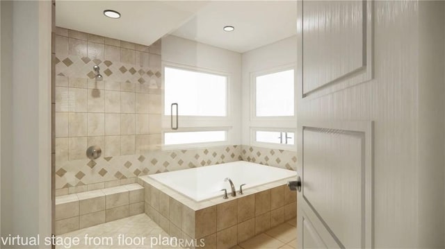 bathroom featuring tile patterned flooring and shower with separate bathtub