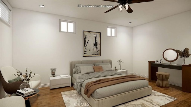 bedroom with ceiling fan and hardwood / wood-style flooring