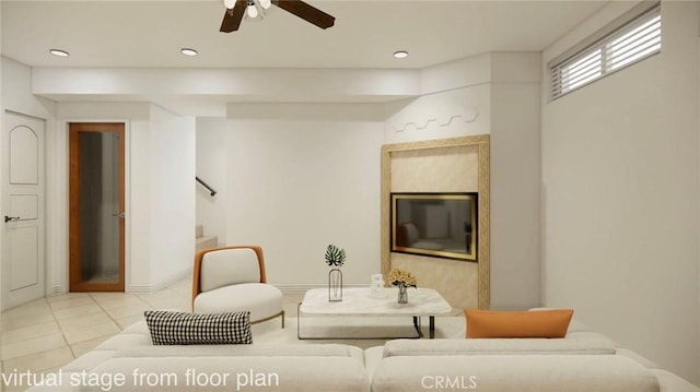 living room featuring ceiling fan and light tile patterned flooring