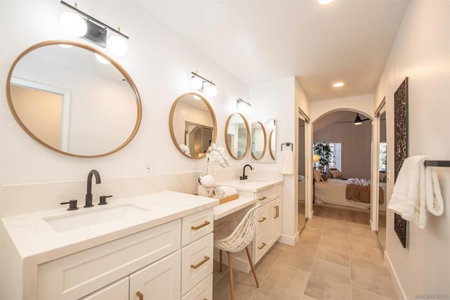 bathroom featuring vanity, tile patterned floors, and ceiling fan