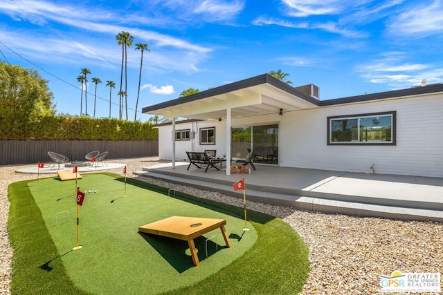 rear view of house featuring a patio area