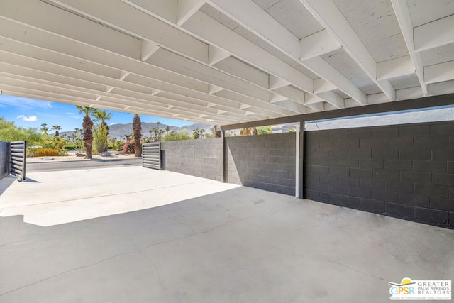 view of patio / terrace with a mountain view