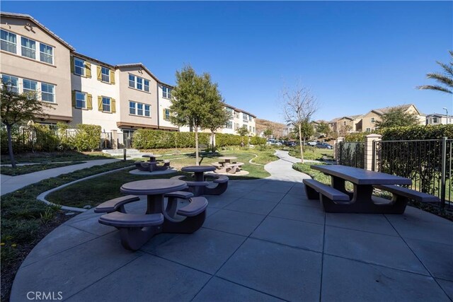 view of community with a patio area