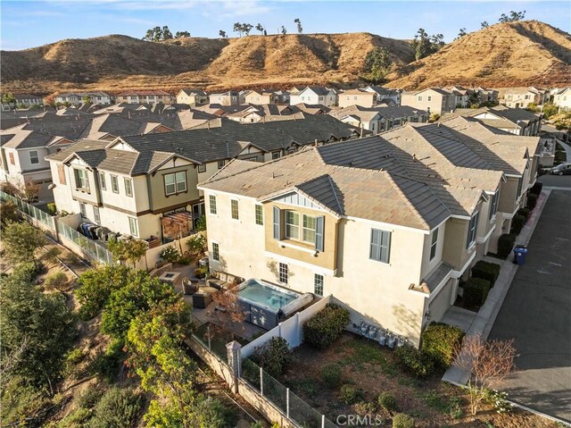 drone / aerial view featuring a mountain view