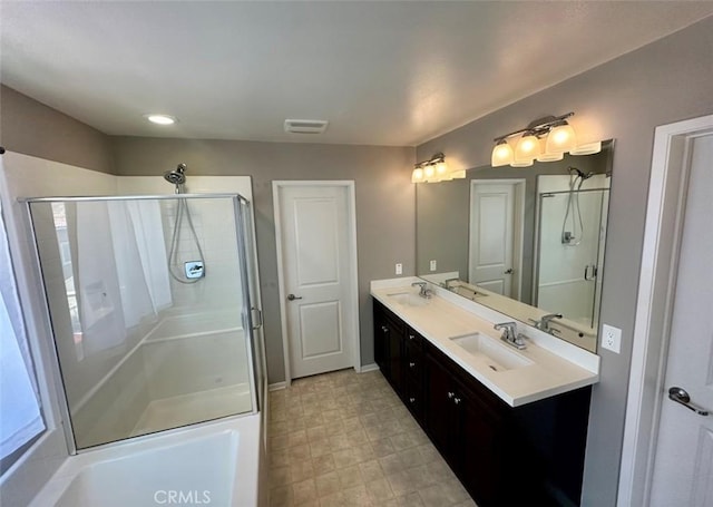 bathroom featuring walk in shower and vanity