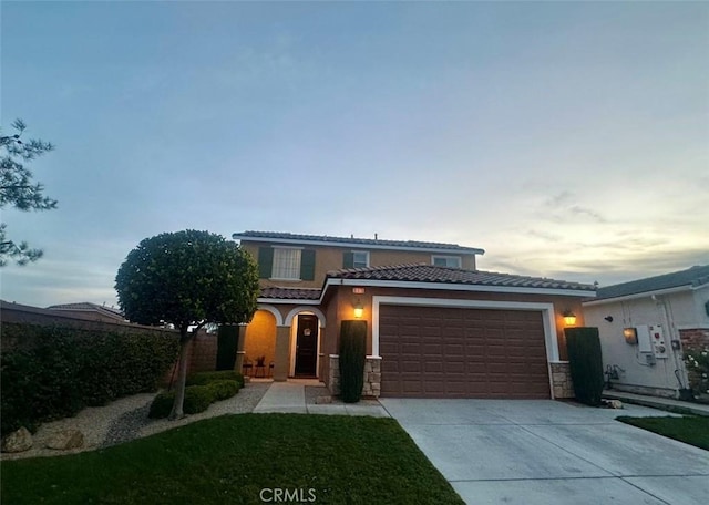 view of front of home with a garage