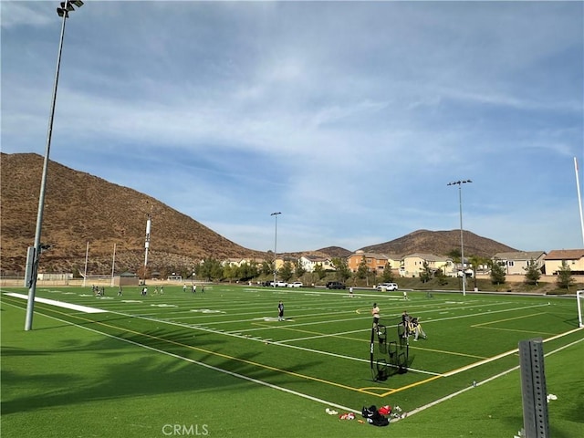 surrounding community featuring a mountain view