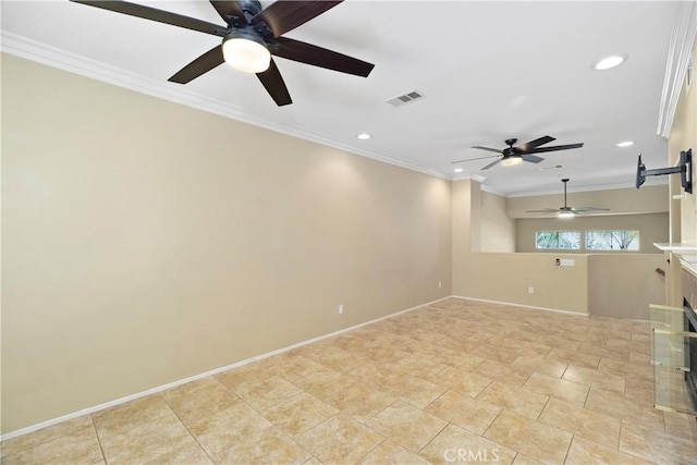 spare room featuring crown molding and ceiling fan